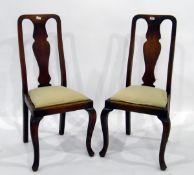 Set of four oak dining chairs of revived Georgian style with vase shaped splat backs