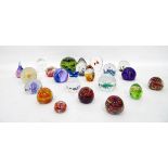 Collection of glass paperweights including a large Mdina example with a mottled green,