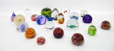 Collection of glass paperweights including a large Mdina example with a mottled green,