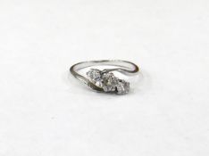 18ct white gold and diamond three-stone ring