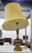 Gilt coloured metal table lamp with cream shade