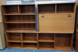 Two modern open shelf bookcases and a similar desk with open shelves below,