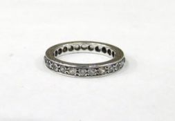 White coloured metal and white stone full eternity ring,