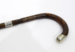 Silver mounted and wooden walking cane with engraved decoration