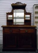 Late Victorian walnut mirror back sideboard with bevelled plates and open shelves,