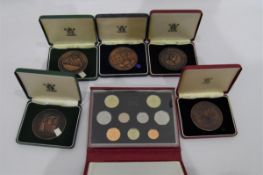 Five Royal Mint commemorative bronze medals including one to celebrate the 500th anniversary of the