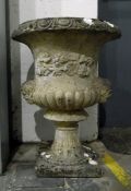 Large stoneware garden urn on stepped base,