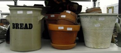 Quantity of terracotta garden pots, a large cream stoneware pot, other planters,