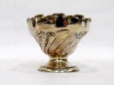 Edwardian pedestal sugar bowl of spirally wrythen form, with repousse floral clover leaf sprays,