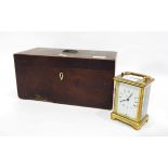 Fitted mahogany tea caddy, the central circular holder missing, the compartments hinged,