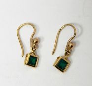 Pair of gold and emerald set drop earrings,