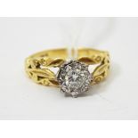 18ct gold solitaire diamond ring, the diamond in white gold illusion setting,