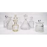 Six cut glass and moulded glass decanters of various designs and a cut glass biscuit barrel (7)