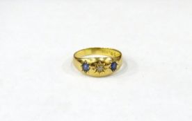 18ct gold ring set with single diamond flanked by two blue-coloured stones, 4g in total,