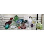Large quantity of glass paperweights and other items including a green glass dump paperweight,
