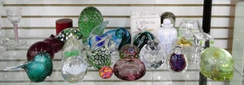 Large quantity of glass paperweights and other items including a green glass dump paperweight,