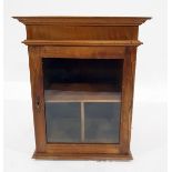 Old walnut glazed wall cupboard enclosing compartments,