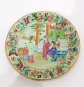 Pair of Chinese famille rose porcelain plates on a green ground, decorated with figures,