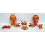 Pair of Moorcroft baluster vases decorated in orange lustre glaze, impressed marks to base,