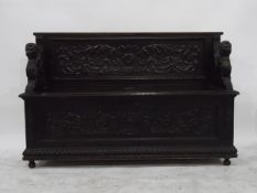 Victorian carved oak renaissance style box seat hall bench,