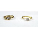 18ct gold solitaire ring set with single white stone (not testing as diamond) and a 9ct gold knot