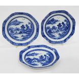 Set of three Chinese blue and white octagonal-shaped dishes decorated with pagodas in a landscape,