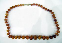 Amber graduated beaded necklace, possibly heat treated signs of some spangles,