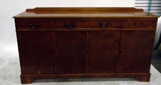 Reproduction yew wood sideboard with three frieze drawers (one drop handle missing) with three