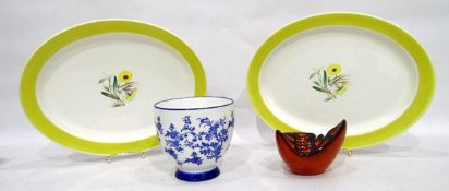 Pair of Susie Cooper oval serving dishes painted with flowers within a marigold yellow border,