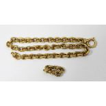 Gold chain link necklace, alternating reeded and twin oval links, with extra section as pendant,