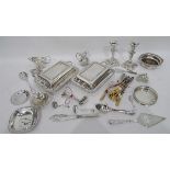 Large quantity of silver plate to include trays, flatware, pair of silver candlesticks,