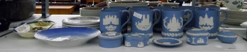 Quantity of blue jasperware Wedgwood-style tankards, decorated with abbeys and cathedrals,