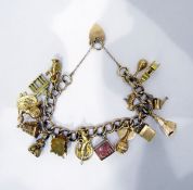 9ct gold charm bracelet with assorted gold charms,