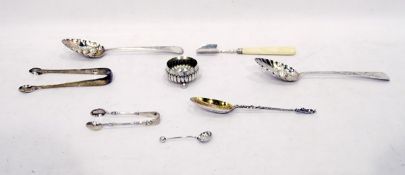 Pair of George III silver berry spoons with repousse and chase decoration,