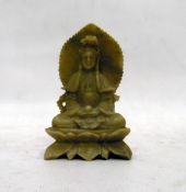 Carved jade figure of a seated deity,