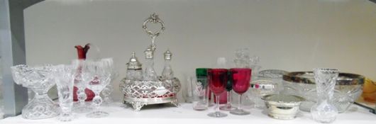 Quantity of glassware including a cranberry glass jug, a cut glass fruit bowl with plated mounts,