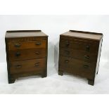 Pair of small chests of drawers, utility style, with shell metal handles, three drawers below,