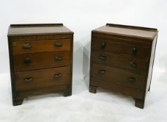 Pair of small chests of drawers, utility style, with shell metal handles, three drawers below,