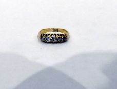 18ct gold and diamond dress ring set with five graduated old cut stones in pierced setting