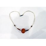 Gold-coloured and amber-coloured beaded necklace,