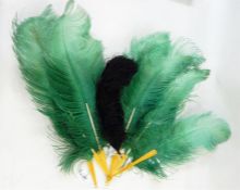 Green and bakelite ostrich feather fan (one stick broken) with a black ostrich feather