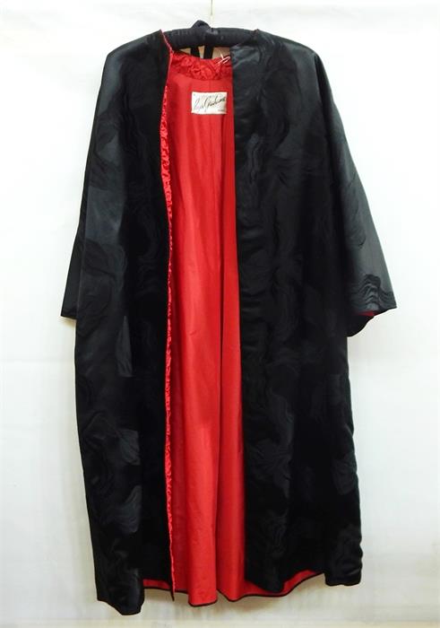 1920's opera coat, black figured satin, re-lined red tafferta with three-quarter length sleeves,