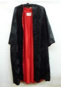 1920's opera coat, black figured satin, re-lined red tafferta with three-quarter length sleeves,