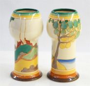 Pair of Clarice Cliff 'Bizarre' pattern vases, bulbous topped to cylindrical base, 21cm high (2)