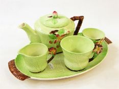 Carltonware teaset comprising teapot, milk jug, cup, sugar bowl and two-handled tray, leaf