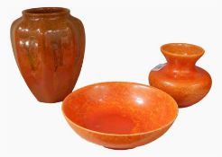 Lancastrian vase, orange glaze, another smaller squat vase and a bowl (3)