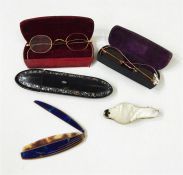 Assorted folding spectacles in cases, a folding tr