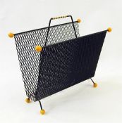1960's magazine rack with yellow ball feet and finials