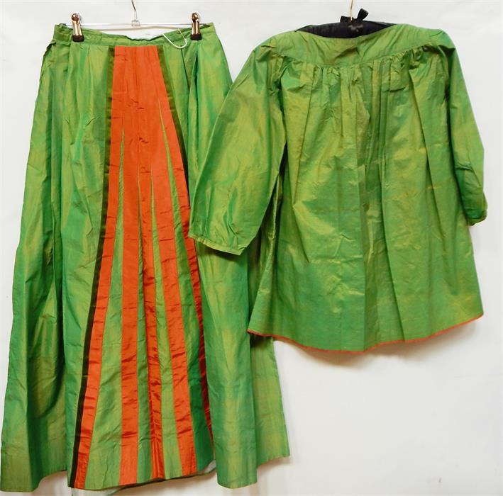 Shock green silk taffeta skirt with matching tunic top, the central panel of the skirt slashed