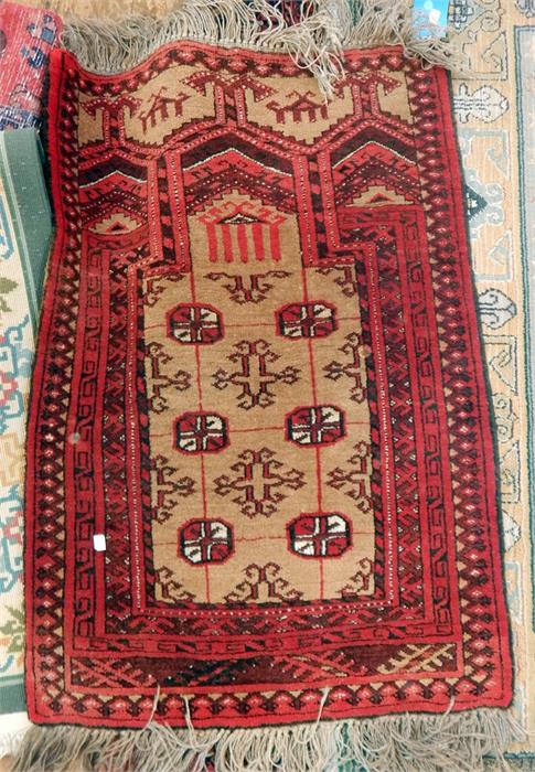 Silk prayer rug showing animals, with a central ca